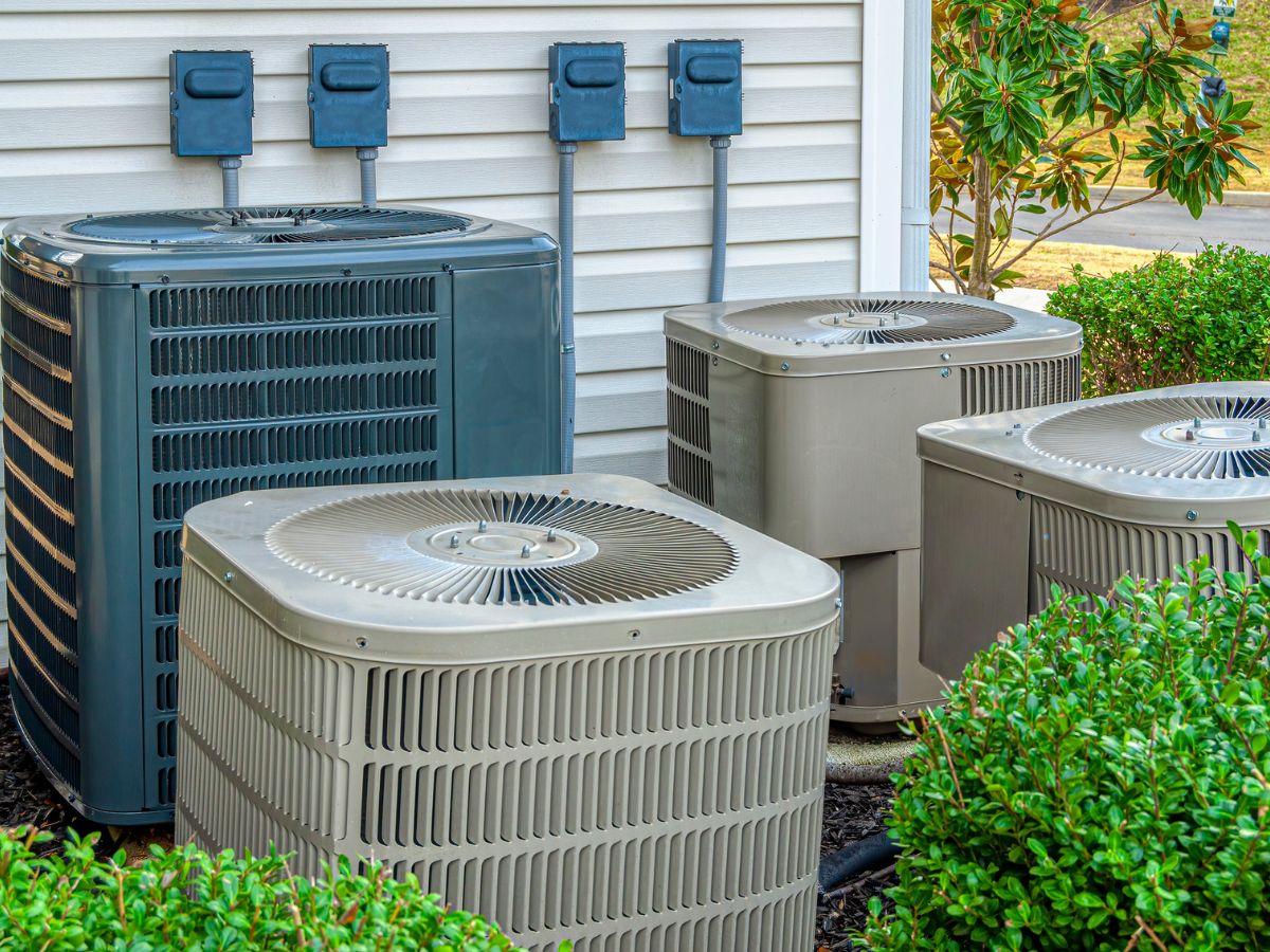 Modern residential HVAC system installed beside a building